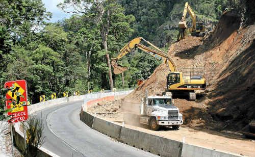 A photo from July 2011 of the damages being repaired at Cunningham's Gap. A photo from July 2011 of the damages being repaired at Cunningham's Gap.